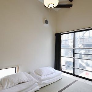 Kamer met Twee Aparte Bedden in Japanse Stijl